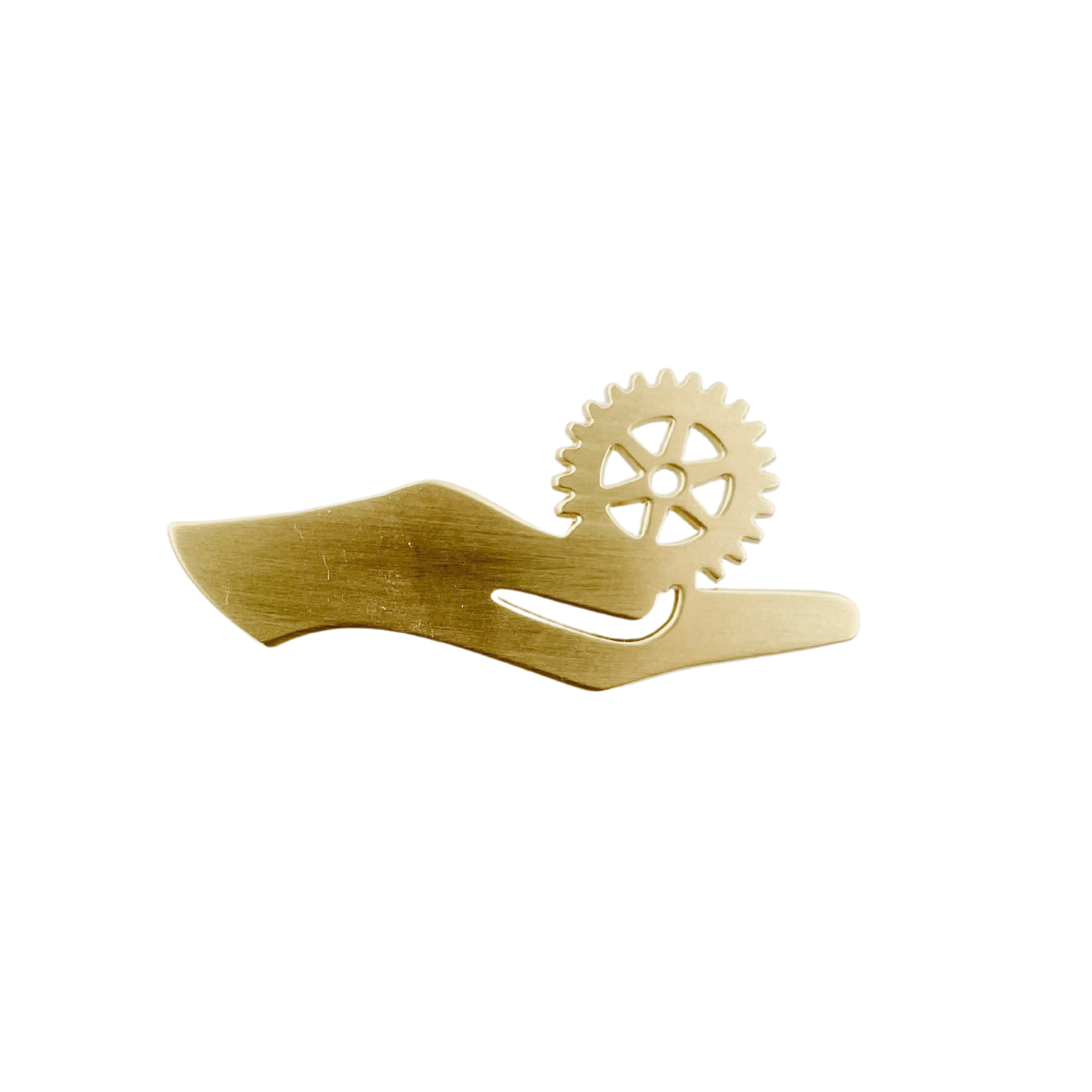 Broche fabriquée par Louise Vurpas pour le Rotary Club. Bijouterie-joaillerie sur-mesure